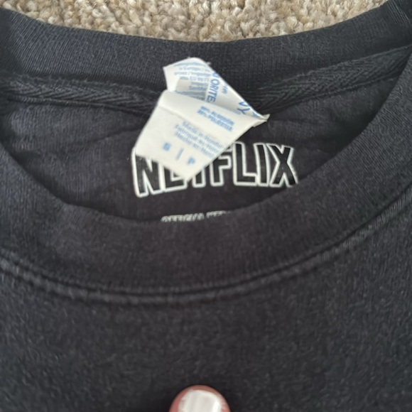 Small black sweatshirt from the ‘Netflix’ store from Julie & the Phantoms. - Picture 2 of 2